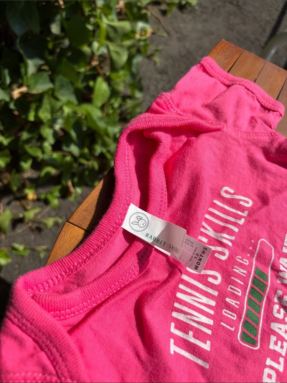 Pink Baby Onesie with 'Tennis Skills Loading' Graphic